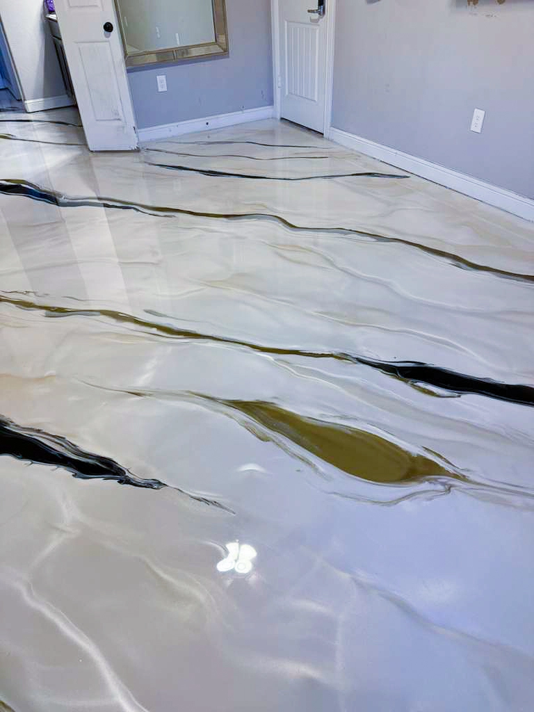 Custom metallic epoxy floor installation in Houston