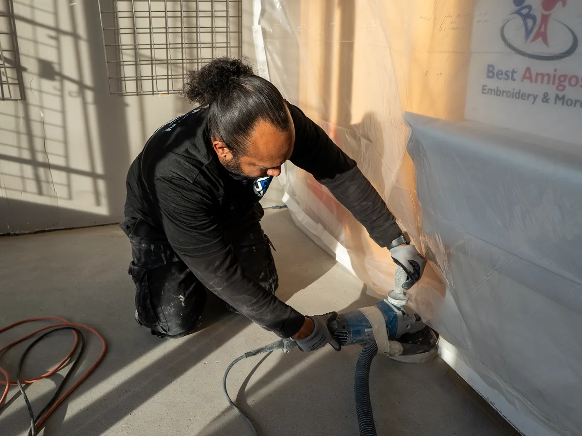 HFC owner Jared Garcia walking a completed Houston garage floor install