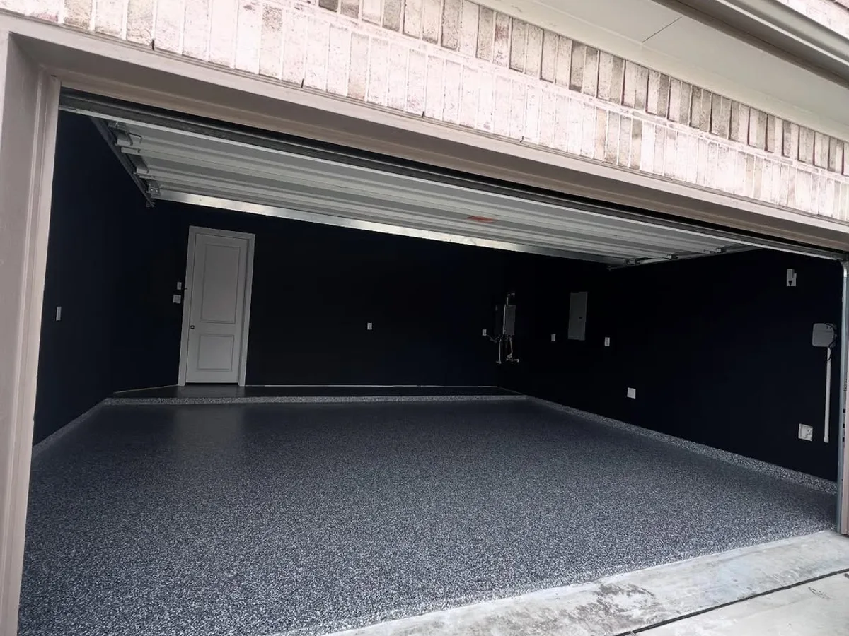Epoxy garage with dark painted walls in Katy, TX