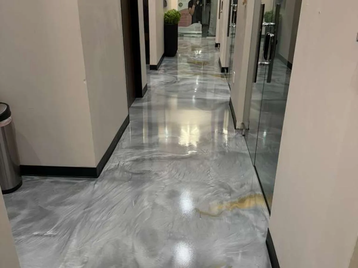 Gray metallic epoxy in The Woodlands commercial hallway